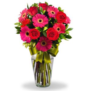 Florero con gerberas fiusha y 6 rosas rojas