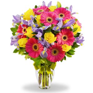 Florero con iris, gerberas y rosas amarilla