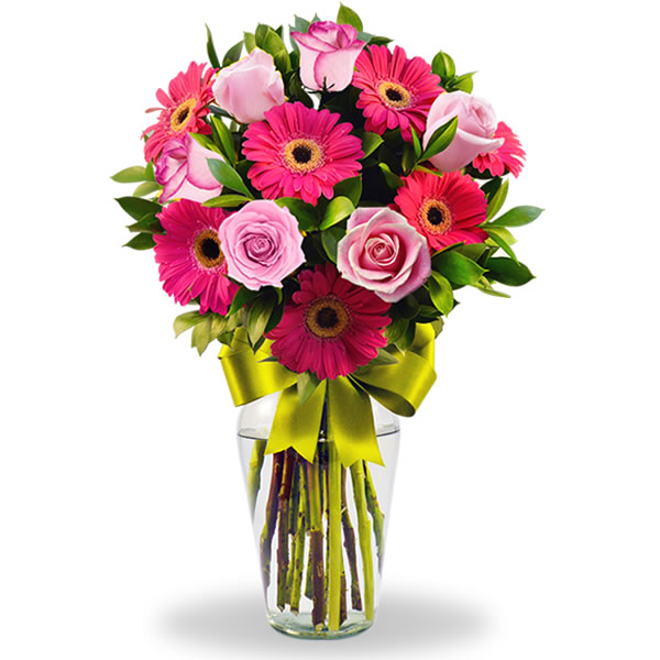 Florero con gerberas fiusha y 6 rosas rosa 2322